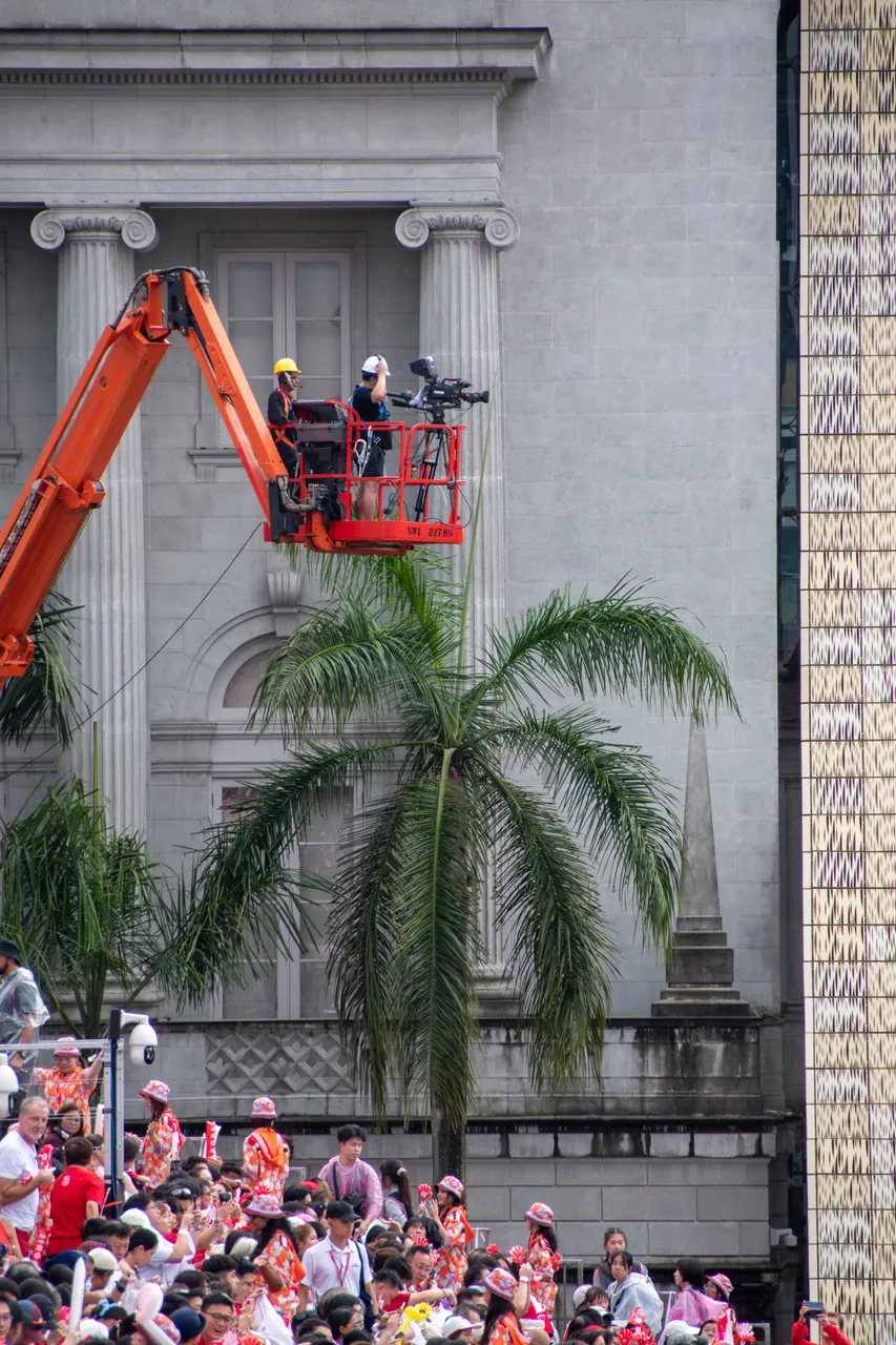 Videographer on crane